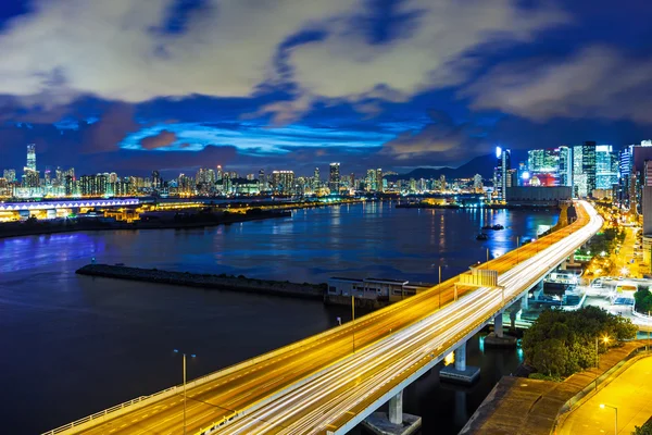 Hong Kong city with highway at night — Stock Photo, Image