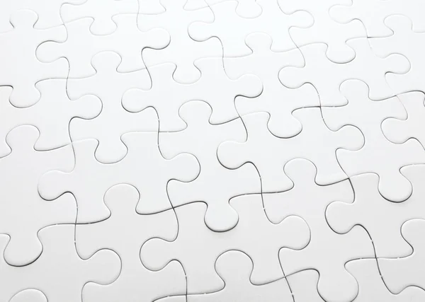 Complete white jigsaw puzzle — Stock Photo, Image