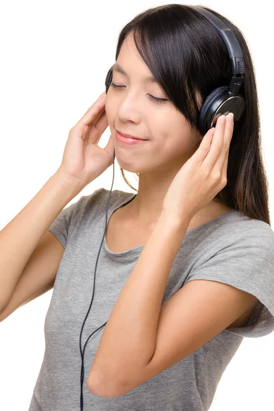 Asian woman enjoy music with earphone — Stock Photo, Image