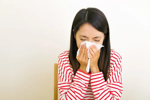 Asian woman sneezing — Stock Photo, Image