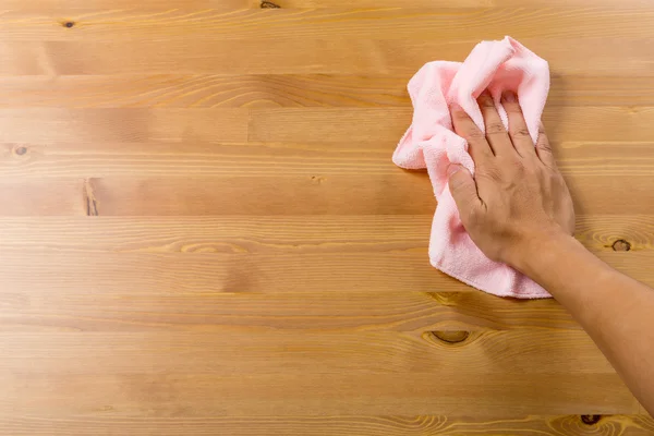 Cleaning table by hand — Stock Photo, Image