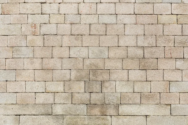 Серая кирпичная стена — стоковое фото