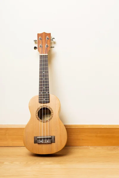 Ukulele on the floor — Stock Photo, Image