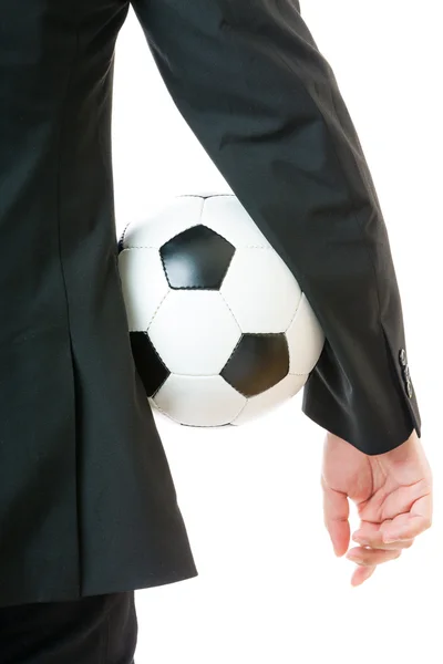 Empresário segurando bola de futebol — Fotografia de Stock