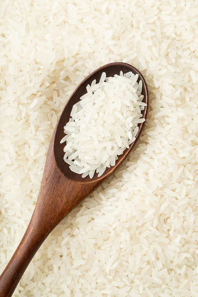 Chinese white rice on teaspoon — Stock Photo, Image