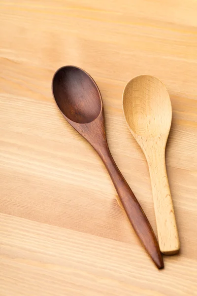 Wooden teaspoon on the table — Stock Photo, Image