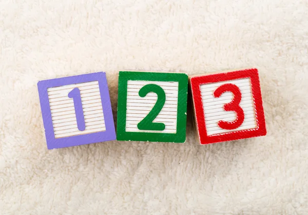 123 toy block with towel background — Stock Photo, Image