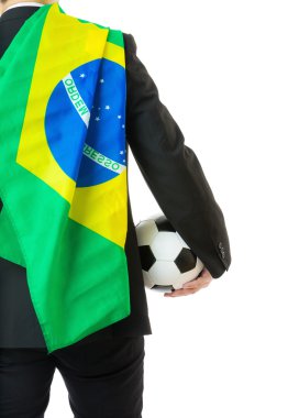 Brezilya bayrağı futbol topu tutan Asya iş adamı