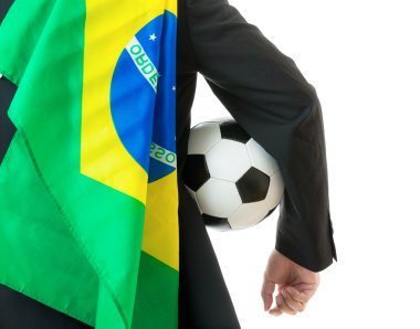 Futbol topu ve Brezilya bayrak tutan işadamı