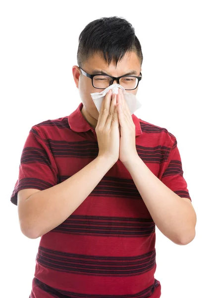 Asian man sneezing — Stock Photo, Image