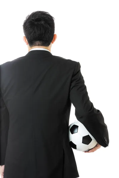 Rear view of businessman with soccer ball — Stock Photo, Image