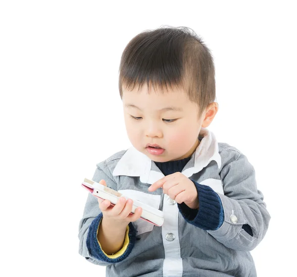 Young boy using mobile — Stock Photo, Image