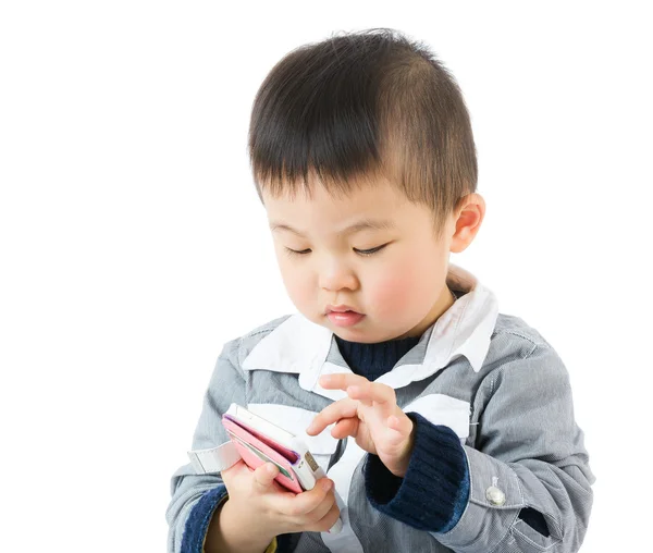 Asian little boy touching the smartphone — Stock Photo, Image