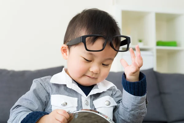 Asian boy wear glasses with mirror — Stock Photo, Image