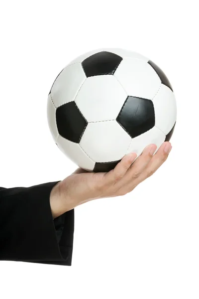 Hand golding soccer ball — Stock Photo, Image