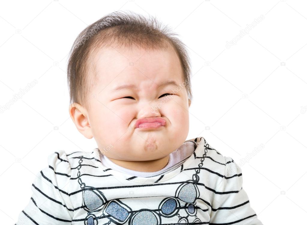 Asian baby girl make upset face &#8212; Stock Photo © leungchopan #38452173