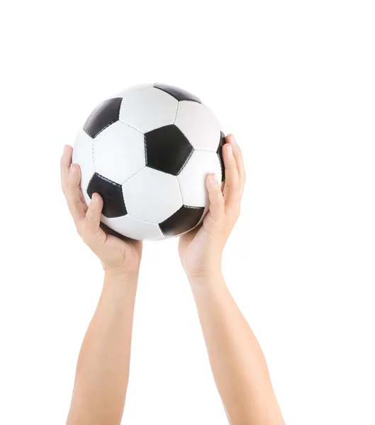 Mãos segurando bola de futebol — Fotografia de Stock