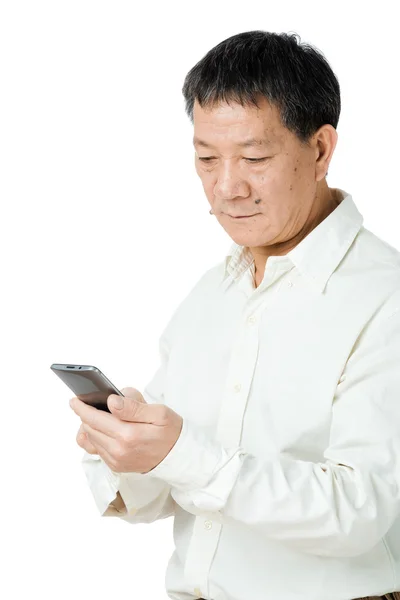 Senior man looking at mobile — Stock Photo, Image