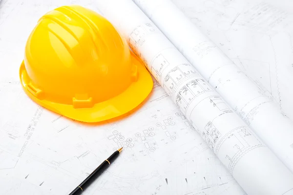 Construction drawing and safety helmet — Stock Photo, Image