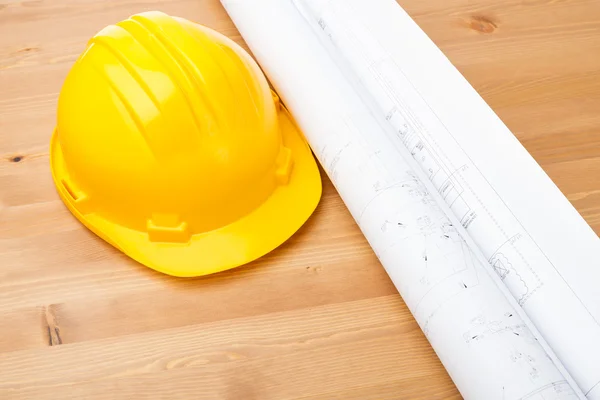 Architecture drawing and safety helmet — Stock Photo, Image