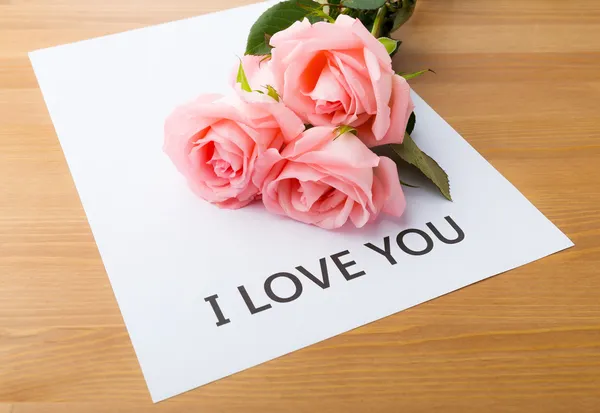 Rose and message card — Stock Photo, Image