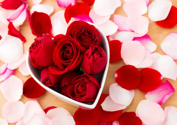 Rose inside the heart shape bowl — Stock Photo, Image