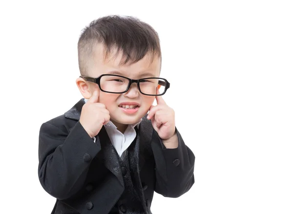 Baby jongen vinger wijzen op zijn oog — Stockfoto