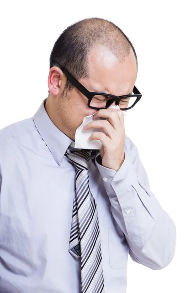 Asian businessman sneezing — Stock Photo, Image