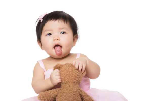 Bebé niña muestra lengua — Foto de Stock