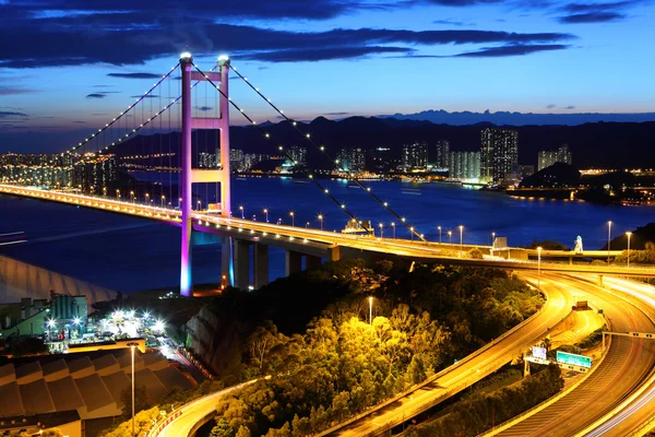 Міст на заході сонця в Hong Kong — стокове фото