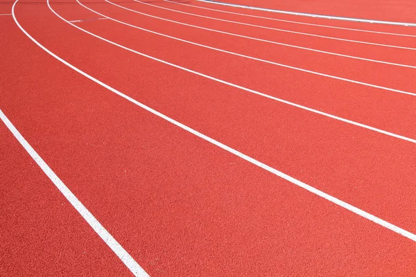 Atletiekbaan in het rood — Stockfoto