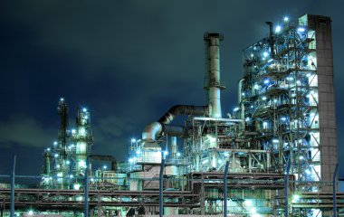 Petrochemical plant at night clipart