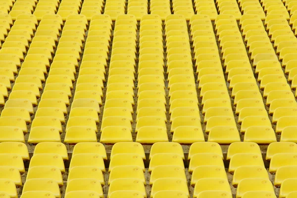 Sedile giallo nello stadio sportivo — Foto Stock