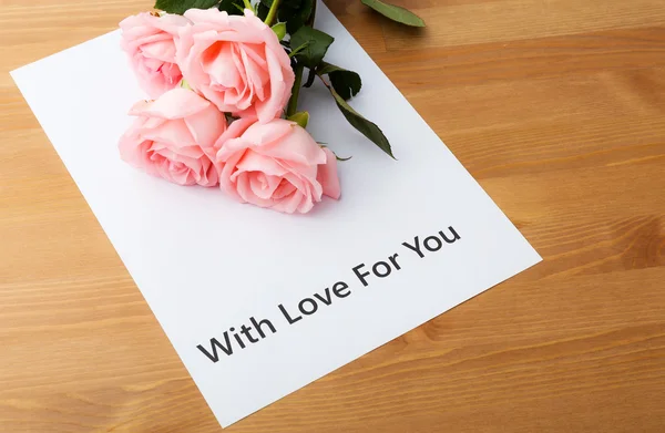 Pink rose and love message — Stock Photo, Image