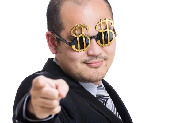 Rich businessman wear dollar sign glasses pointing to you — Stock Photo, Image
