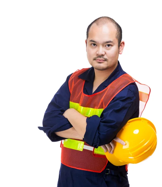 Trabalhador local de construção segurando capacete — Fotografia de Stock