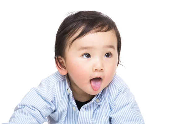 Asian baby showing tongue — Stock Photo, Image