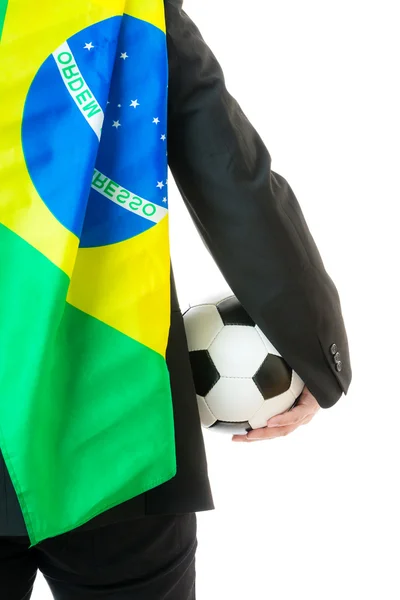 Futbol topu ve Brezilya bayrağı ile işadamı dikiz — Stok fotoğraf