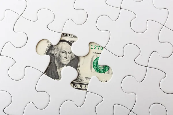 US dollar banknote and puzzle — Stock Photo, Image