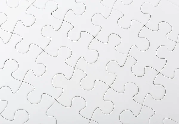 Completed white puzzle — Stock Photo, Image