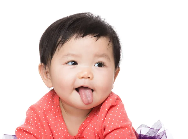 Baby with tongue sticking out — Stock Photo, Image