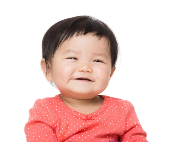 Улыбающийся азиатский ребенок — стоковое фото