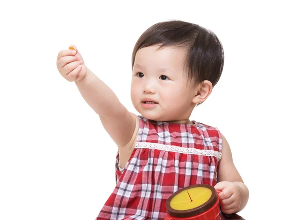 Asian baby girl holding snack box and hand up — Stock Photo, Image