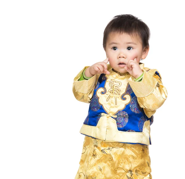 Asiatisk pojke med kinesiska kostym och finger peka mot ansikte — Stockfoto