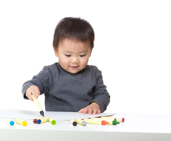 Ásia bebê menino concentrar no desenho — Fotografia de Stock