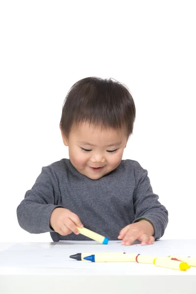 Kid drawing with crayon — Stock Photo, Image