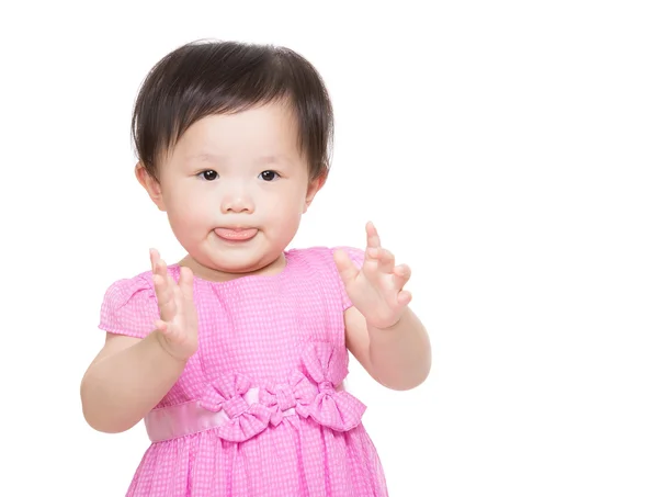 Azië babymeisje maken funny gezicht en klappen hand — Stockfoto