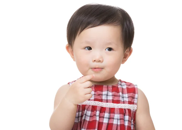 Meisje van de baby van Azië touch haar mond — Stockfoto