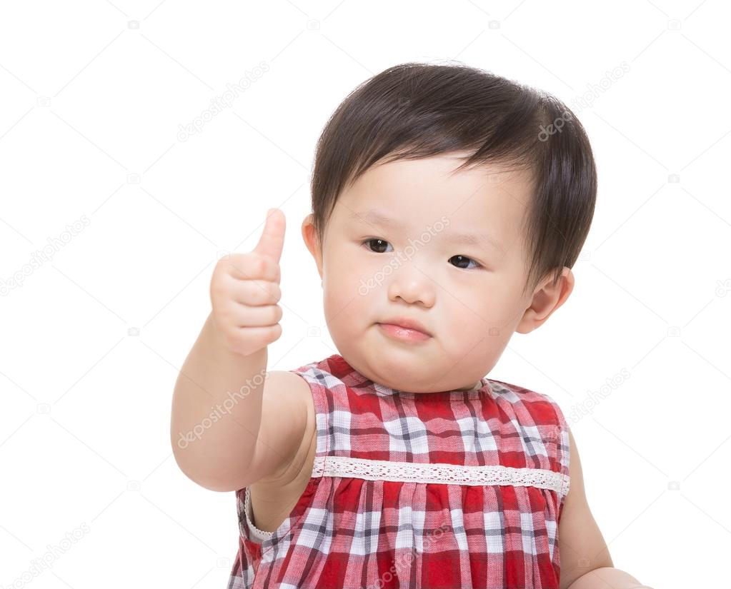 Asia baby girl with thumb up