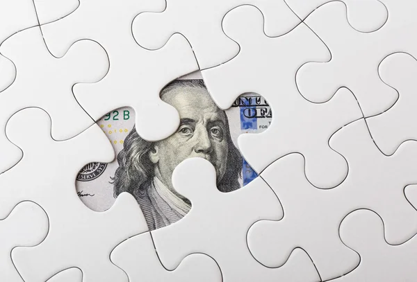White puzzle with American dollar — Stock Photo, Image